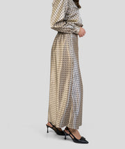 Ensemble en satin à pois gris jupe coté