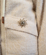 Manteau en bouclettes beige détails