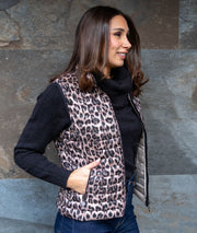 Doudoune sans manches léopard noir et beige coté