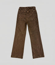 Jean Folya flare marron taille haute arrière fond gris