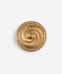 Broche dorée à strass Spirale face