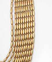Collier à rangs multiples Charlotte jaune détail