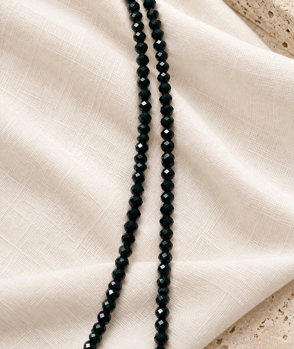 Collier sautoir multi-position en spinelle noir à perles facettées
