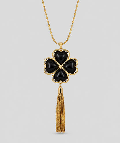 Collier Trèfle doré sautoir avec pendentif noir et franges — marque Carnaby