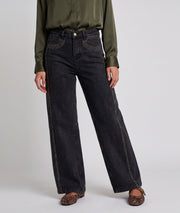 Jean clous femme gris coupe wide leg avec détails sur les jambes