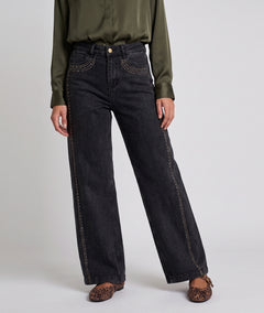 Jean clous femme gris coupe wide leg avec détails sur les jambes