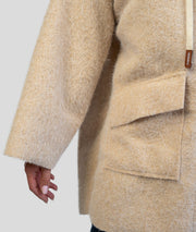 Manteau en bouclettes beige détails