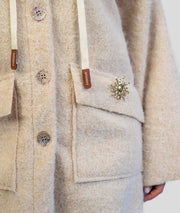Manteau en bouclettes beige détails