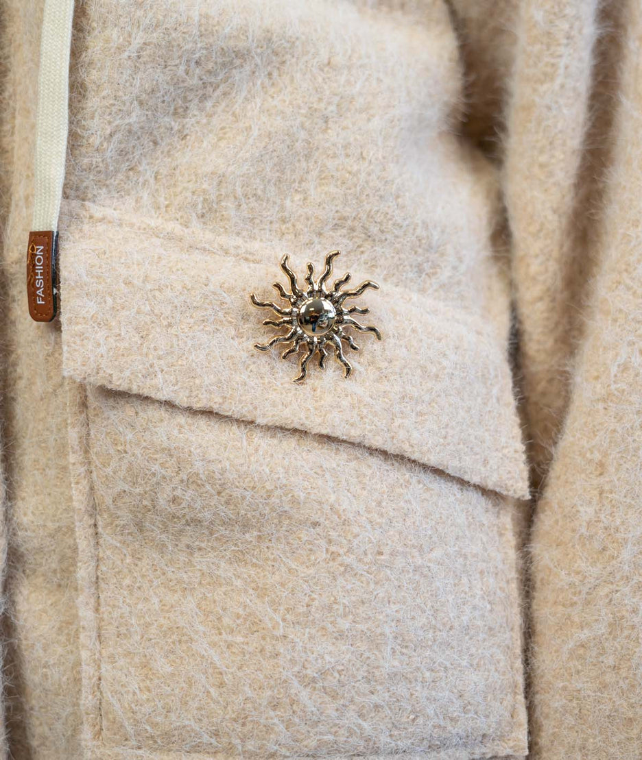 Manteau en bouclettes beige détails