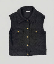 Veste sans manches femme noire en bouclette avant fond gris