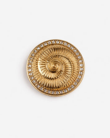 Broche dorée à strass Spirale face