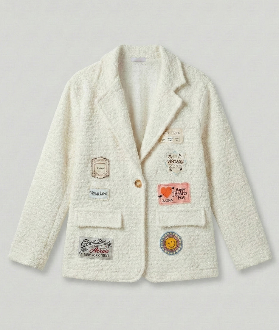 Veste effet mouton brillante avec patchs Narnia avant
