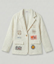 Veste effet mouton brillante avec patchs Narnia avant