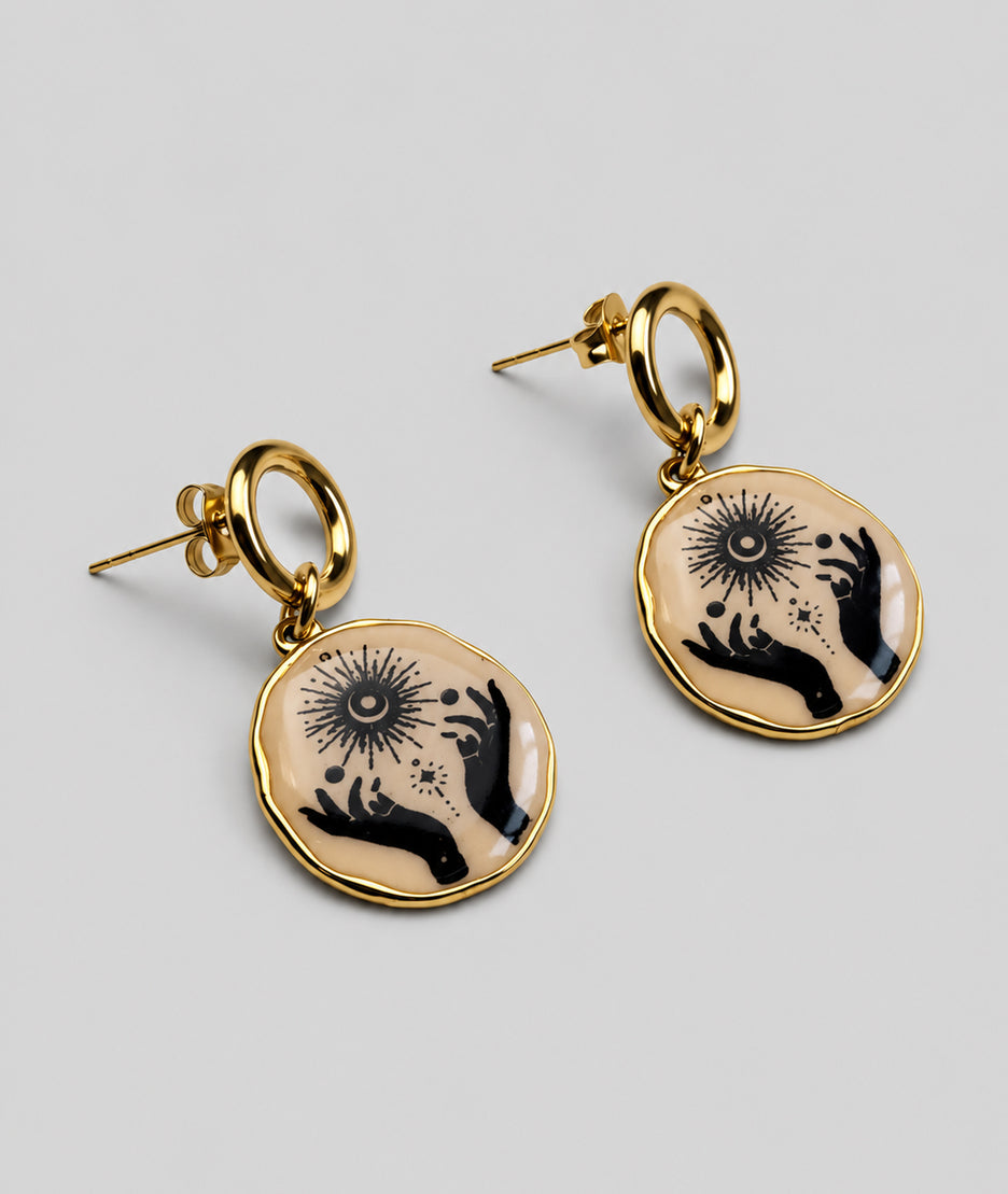 Boucles d'oreilles avec pendentif mains motif solaire
