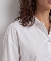 Chemise officier femme blanche à boutons brandebourg