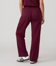 Pantalon jogging femme Spalo large bordeau avec taille élastique et liens à nouer
