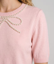 Pull manches courtes femme rose pale en maille fine avec nœud en perles au col